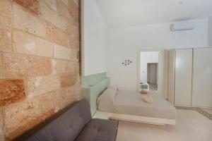 Llit o llits en una habitació de Lecce Santa Chiara Terrace piano rialzato