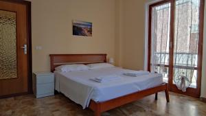 Posteľ alebo postele v izbe v ubytovaní Casa del Surf - By Ligooria