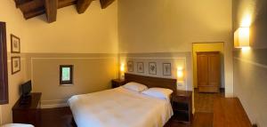 Posteľ alebo postele v izbe v ubytovaní Country House Le Case Coloniche