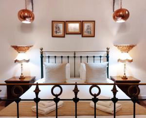 Ein Bett oder Betten in einem Zimmer der Unterkunft Casa Birmula Boutique Hotel