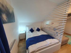 Posteľ alebo postele v izbe v ubytovaní Réteskert vendégház és apartman