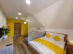 Posteľ alebo postele v izbe v ubytovaní Réteskert vendégház és apartman