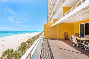 a view of the beach from the balcony of a hotel at Sterling Reef 102 in Panama City Beach