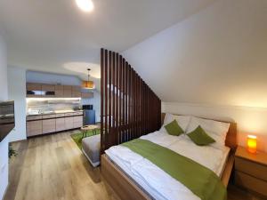 Posteľ alebo postele v izbe v ubytovaní Réteskert vendégház és apartman