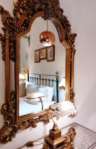 Ein Bett oder Betten in einem Zimmer der Unterkunft Casa Birmula Boutique Hotel