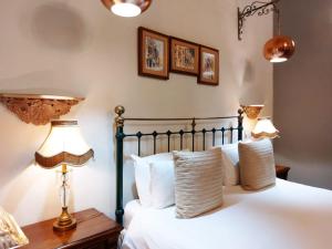 Ein Bett oder Betten in einem Zimmer der Unterkunft Casa Birmula Boutique Hotel