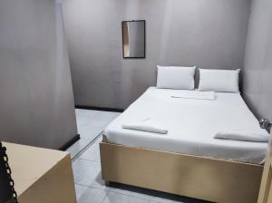 Postel nebo postele na pokoji v ubytování Parkview Hotel