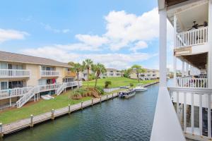 a view of a canal from a balcony of a condo at Sandpiper Cove 4114 in Destin