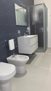 A bathroom at Dependance La Mouette