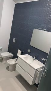 A bathroom at Dependance La Mouette