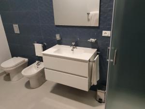A bathroom at Dependance La Mouette
