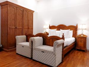 Ein Bett oder Betten in einem Zimmer der Unterkunft Casa Birmula Boutique Hotel
