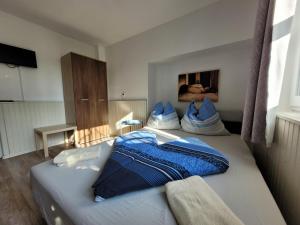 Postel nebo postele na pokoji v ubytování VilLa AdeLe
