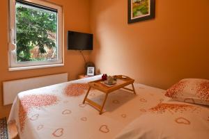 Postel nebo postele na pokoji v ubytování Apartman Ristivojevic Zlatibor