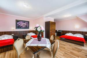 Łóżko lub łóżka w pokoju w obiekcie Vena
