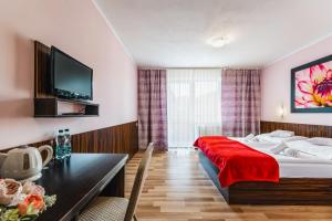 Łóżko lub łóżka w pokoju w obiekcie Vena