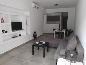 Khu vực ghế ngồi tại Estia - Brand new apartment in Ermioni Village