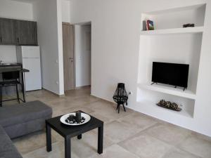 Kuchyň nebo kuchyňský kout v ubytování Armonia - Brand new apartment in Ermioni Village