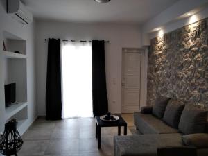 Posezení v ubytování Armonia - Brand new apartment in Ermioni Village