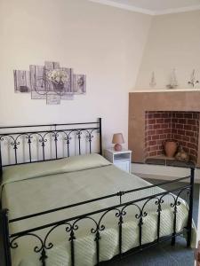 Postel nebo postele na pokoji v ubytování Dimora Varchi