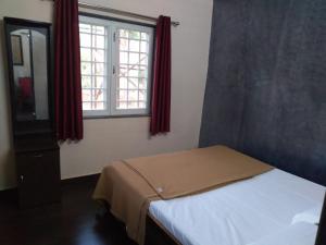 BimalFarm at Koroli Hills客房内的一张或多张床位