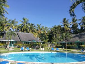 Hotel Villas Las Palmas al Mar tesisinde veya buraya yakın yüzme havuzu