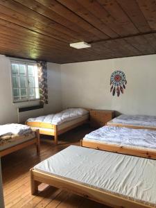 Postel nebo postele na pokoji v ubytování Chata s duší
