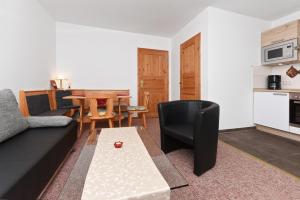 Kuchyň nebo kuchyňský kout v ubytování Pension Pradler Wohnung 1 + 4 fotografie