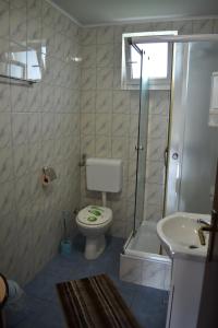 Koupelna v ubytování Apartments Sabljak