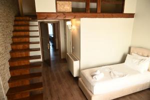 Postel nebo postele na pokoji v ubytování Hotel Onufri