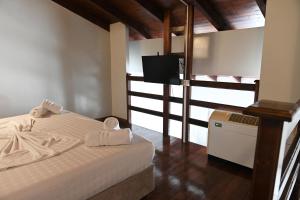 Postel nebo postele na pokoji v ubytování Hotel Onufri