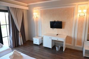 TV a/nebo společenská místnost v ubytování Hotel Onufri