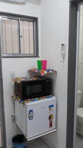 Fotografie z fotogalerie ubytování Sua Kitnet na Praia 12 Atenção PEQUENA Só prá dormir Ambiente Familiar Ar Cond TV Microondas Frigobar Internet Centro v destinaci Vila Velha