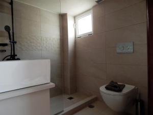 Koupelna v ubytování Posidonio Hotel