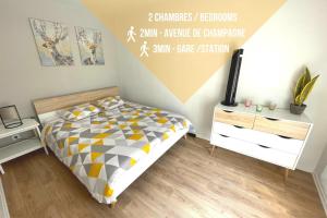 a bedroom with a bed and a sign on the wall at BOUCHON POUR 4 Avenue de Champagne à 3 minutes in Épernay