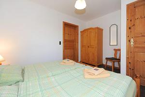Ein Bett oder Betten in einem Zimmer der Unterkunft Pension Pradler Wohnung 2