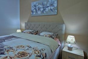 Posteľ alebo postele v izbe v ubytovaní Holiday House Lana