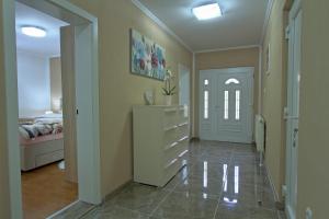 Posteľ alebo postele v izbe v ubytovaní Holiday House Lana