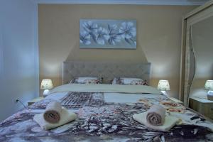 Posteľ alebo postele v izbe v ubytovaní Holiday House Lana