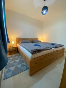 Ένα ή περισσότερα κρεβάτια σε δωμάτιο στο Šírava Resort +40 φωτογραφίες