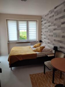 Posteľ alebo postele v izbe v ubytovaní Homestay Willa Anna