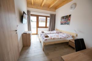 Postel nebo postele na pokoji v ubytování Chalupa U Stodoly + 22 fotografií