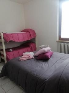 Posteľ alebo postele v izbe v ubytovaní B&B Nonna BI