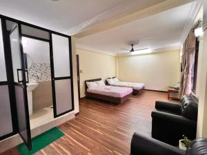 Voodi või voodid majutusasutuse Lasa Kusa Homestay toas
