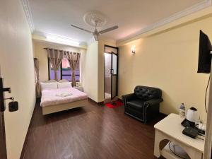Voodi või voodid majutusasutuse Lasa Kusa Homestay toas