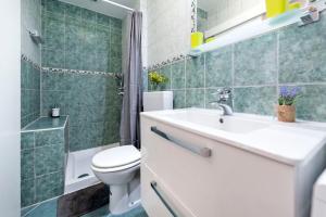 Kúpeľňa v ubytovaní Studio Katja + 11 fotografií