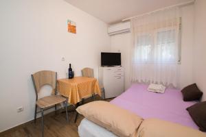 Letto o letti in una camera di Oleander Apartments Split
