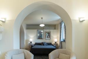Ein Bett oder Betten in einem Zimmer der Unterkunft Casa Belvedere