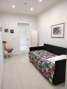 Ένα ή περισσότερα κρεβάτια σε δωμάτιο στο Zenzero e Limone