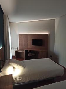 Postel nebo postele na pokoji v ubytování ARVA Spa París